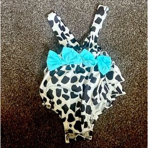 Cow print bubble style romper.